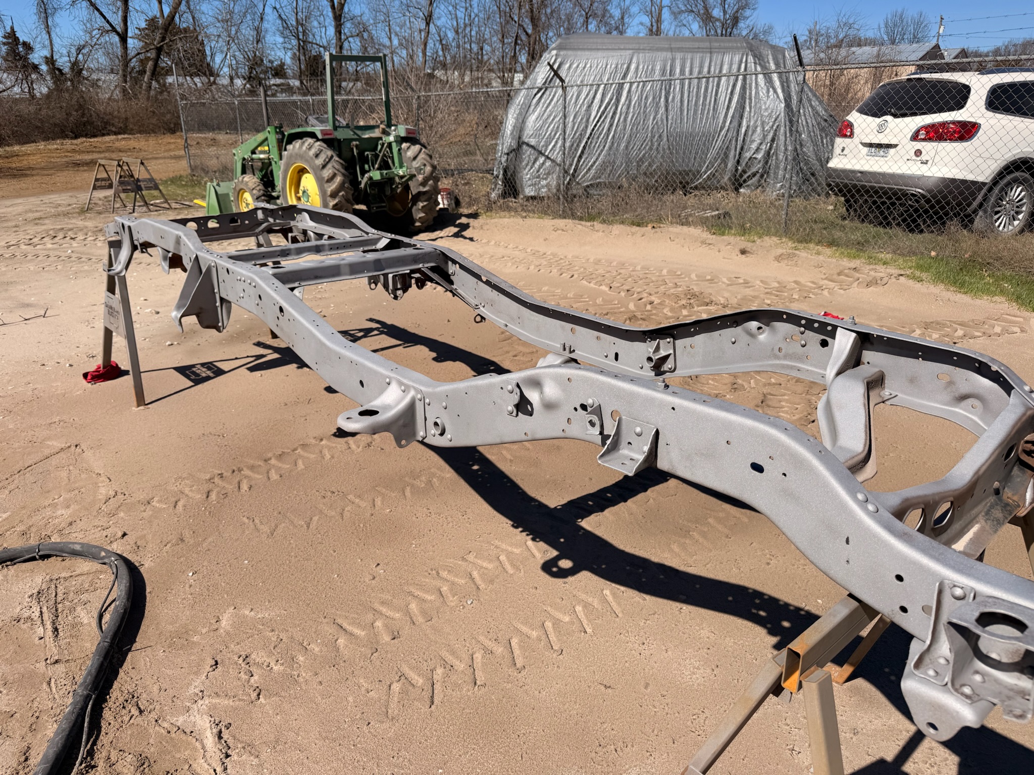 Classic car frame sandblasted to bare metal