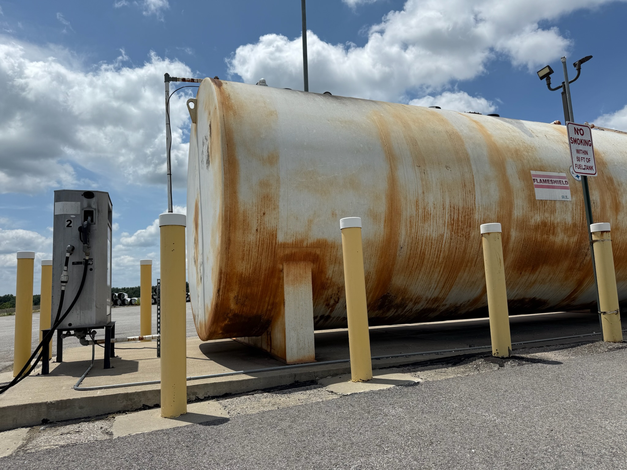 Storage tank covered in rust and corrosion — before sandblasting