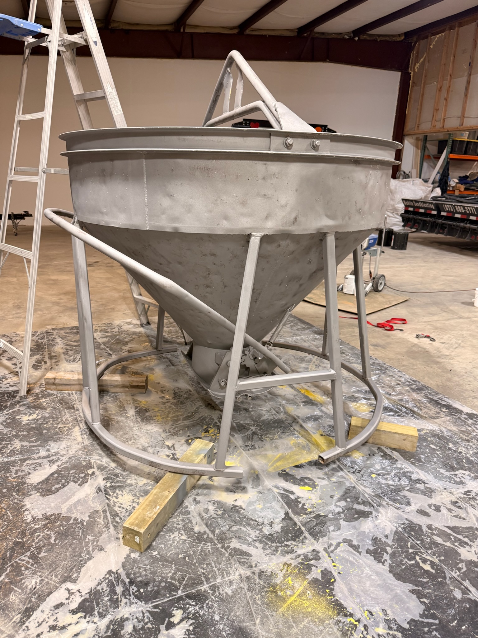 Industrial hopper and vessel blasted clean